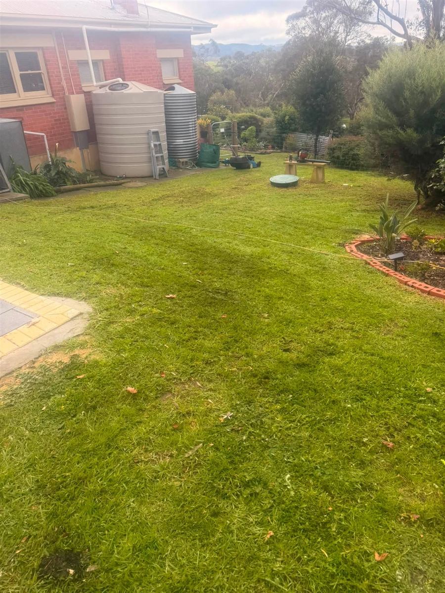 Lawn mowed in front of a red brick house near Yankalilla
